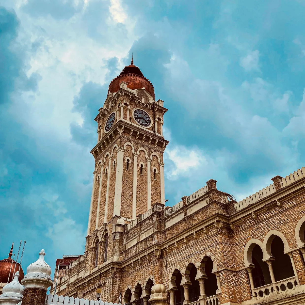 Image of a clocktower in Malaysia on our work permit guide.